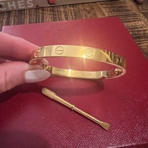 Gold plated love bangle with screws
